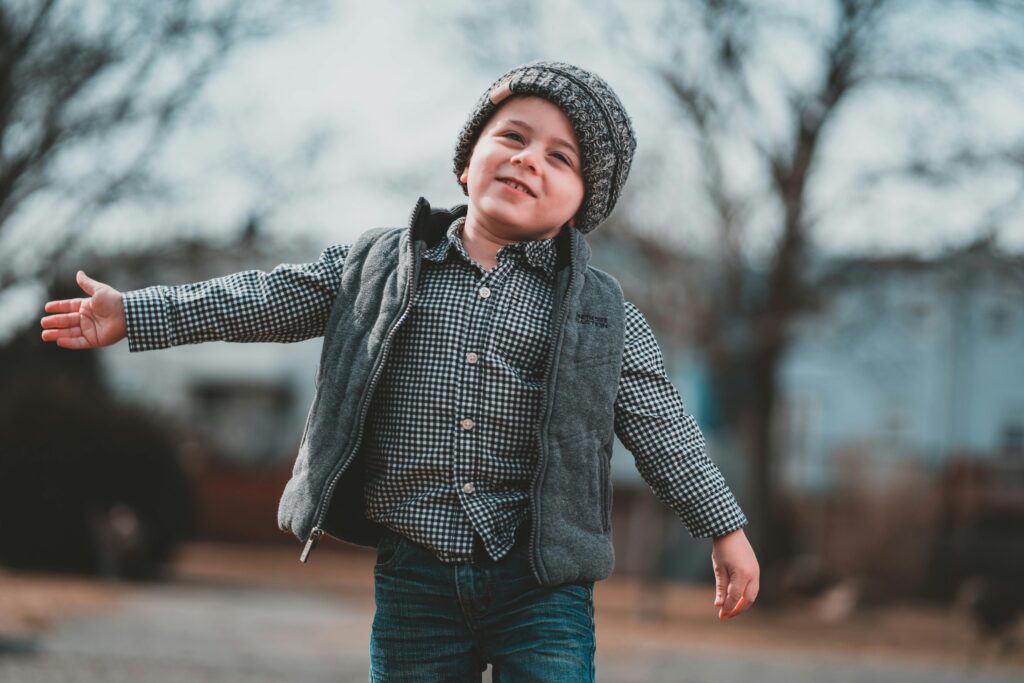 Image of a boy on a walk to represent Dementia UK charity in UK walk a mile a day in September. Image courtesy Pexels.com
